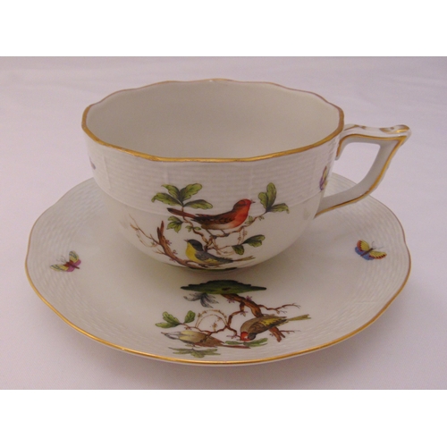 113 - A Herend chocolate cup and saucer, decorated with birds on branches, marks to the bases, 10cm (h)