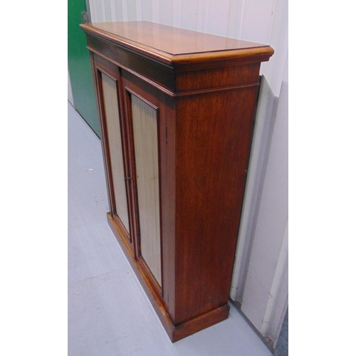 4 - A Regency rectangular cabinet with glazed doors on pedestal base, 106.5 x 89 x 30cm