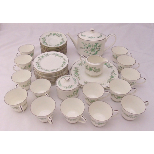 84 - Aynsley Emerald Isle teaset to include a teapot, a milk jug, cups, saucers and plates for twelve pla... 