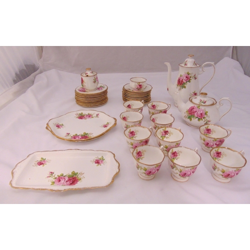 87 - Royal Albert American Beauty teaset to include cups, saucers, plates, teapot, coffee pot, sugar bowl... 