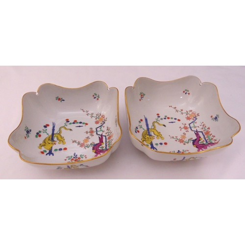 92 - A pair of Meissen Kaikemon fruit bowls decorated with a tiger, flowers and trees, marks to the bases... 