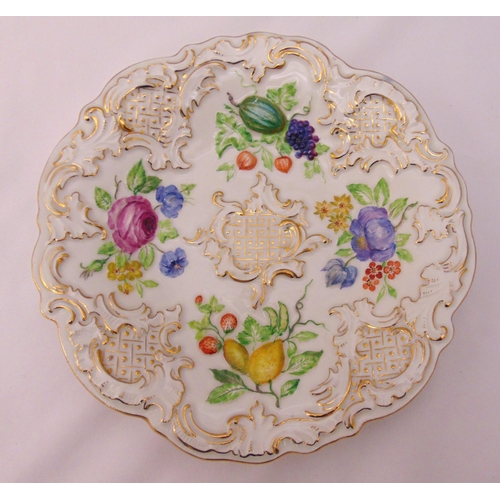 95 - A Meissen plate decorated with flowers, fruit and gilded borders, 23cm (d)