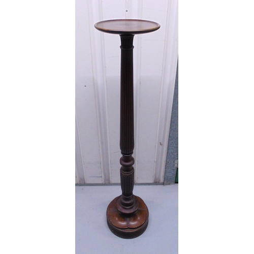 13 - A Victorian mahogany plant stand on raised circular base, 126 x 28cm