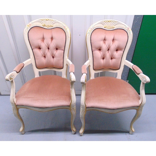 18 - A pair of French style upholstered armchairs on cabriole legs