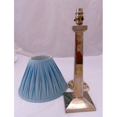 24 - An Art Deco style silver plated table lamp of columnular form on raised square base to include a sha... 