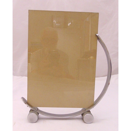 240 - An Art Deco style chrome and glass double sided photograph frame on cylindrical supports, 40.5 x 33c... 