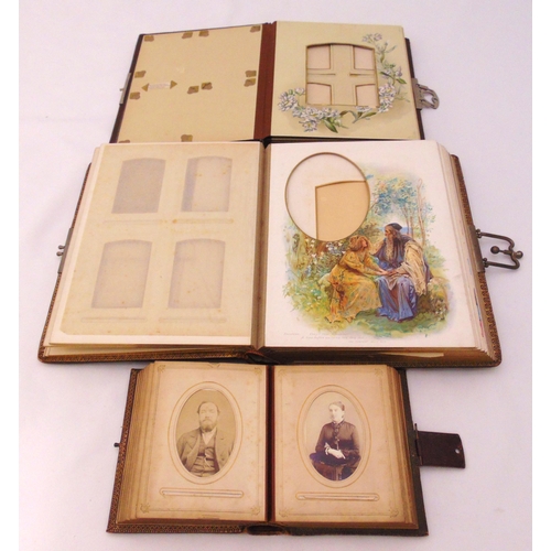 249 - Three Victorian leather bound photograph albums, with some original photos