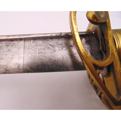 255 - A William IV ceremonial sword with shagreen handle pierced guard in leather and brass scabbard (leat... 