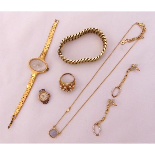 292 - A quantity of costume jewellery to include earrings, a bracelet, a necklace, watches and a ring