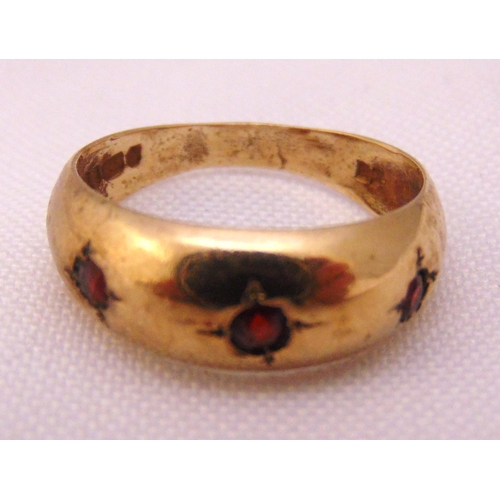 321 - 9ct yellow gold and ruby gypsy set ring, approx total weight 2.4g