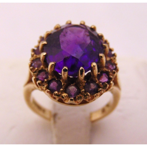 330 - 9ct yellow gold and amethyst dress ring, approx total weight 5.8g