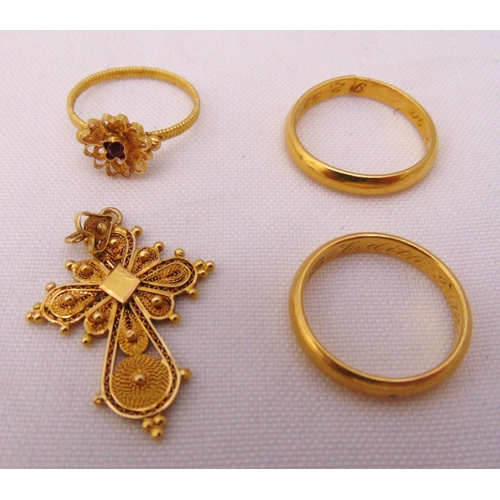 334 - A quantity of gold jewellery to include a crucifix and three rings, tested 18ct, approx total weight... 