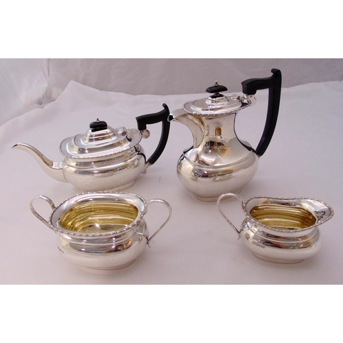 366 - A hallmarked silver four piece tea and coffee set rounded rectangular with beaded borders Sheffield ... 