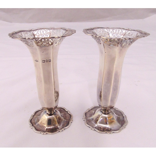 370 - A pair of Victorian hallmarked silver pierced and panelled vases on spreading bases, London 1900, ap... 