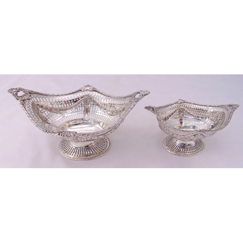 375 - Two Victorian hallmarked silver pierced oval dishes, with husk and shell borders, rosettes and swags... 