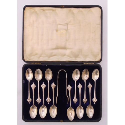 380 - A cased set of twelve hallmarked silver coffee spoons and a pair of matching tongs, Sheffield 1903 b... 