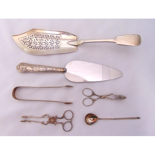 389 - A quantity of silver and white metal to include a Victorian fish slice, London 1842, a cake slice, t... 