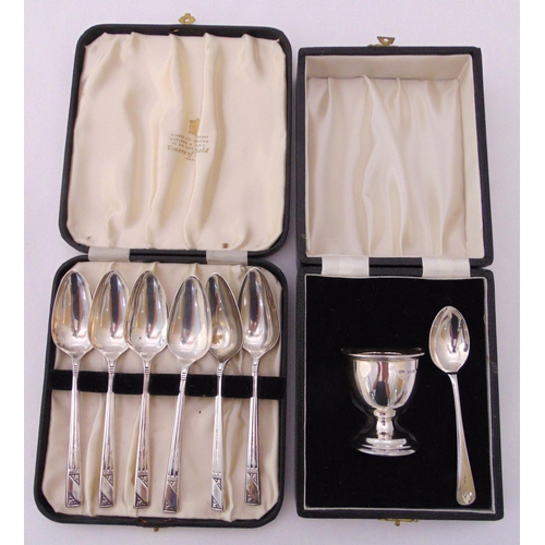 392 - A cased set of hallmarked silver coffee spoons and a cased egg cup and spoon, approx total weight 21... 