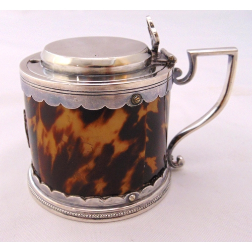 408 - A faux tortoiseshell and silver plated mustard pot with angled handle and raised hinged cover, 6.5cm... 