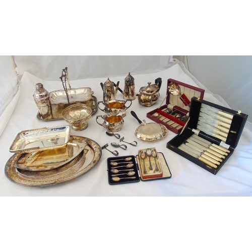 411 - A quantity of silver plate to include a teaset, a cocktail shaker, trays, dishes and cased flatware