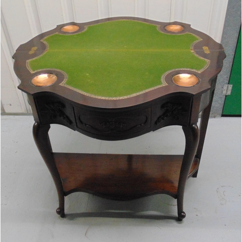 9 - A demi-lune games table with a single drawer on scroll legs and shaped oval base, 75.5 x 85.5 x 41cm