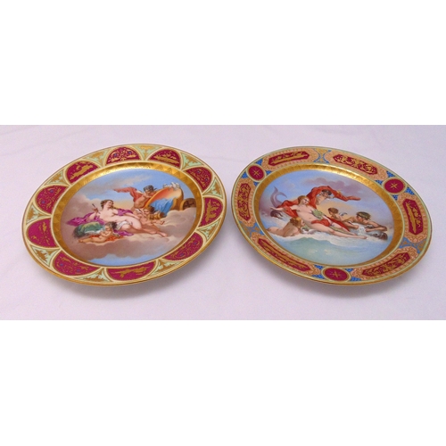 112 - A pair of early 20th century Vienna porcelain chargers by Ackermann and Fritze decorated with classi... 