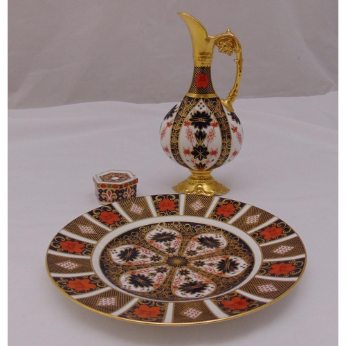 119 - Royal Crown Derby Imari pattern ewer, a matching cabinet plate and a covered box (3)