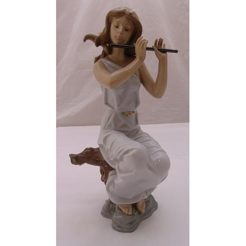 143 - Lladro figurine of a seated siren playing a flute, marks to the base, 35.5cm (h)