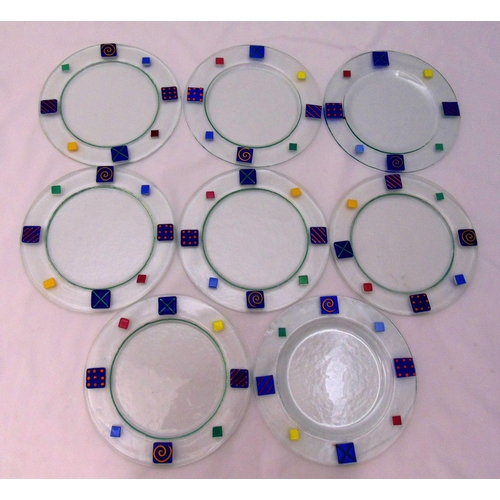 159 - Eight Murano glass plates with polychromatic geometric borders, 26cm (w)