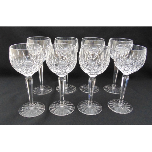 169 - A set of eight Waterford Crystal hock glasses on raised star cut spreading bases