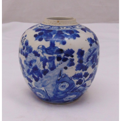 177 - A Chinese blue and white spherical ginger jar decorated with prunus blossom, trees, birds and butter... 