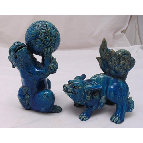 191 - A pair of late Qing dynasty stylised turquoise glazed Lions, tallest 23cm (h)