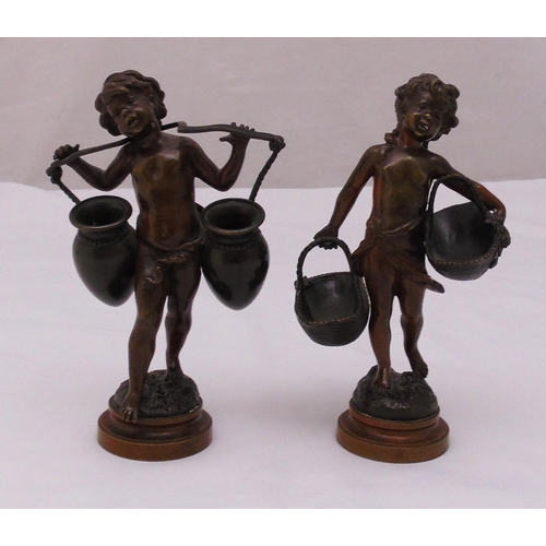 201 - A pair of Auguste Moreau bronze figurines of children carrying baskets and urns on raised circular m... 