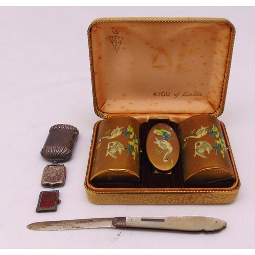 226 - A quantity of collectables to include a hallmarked silver vesta case, a fruit knife with silver blad... 