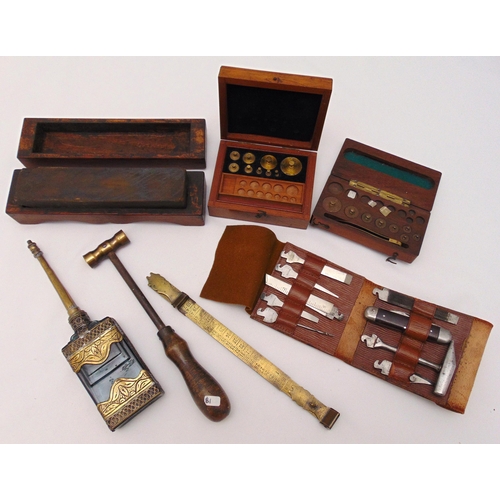 231 - A quantity of collectables to include a tool kit, a gas hammer, a shoe size measure, a blade sharpen... 