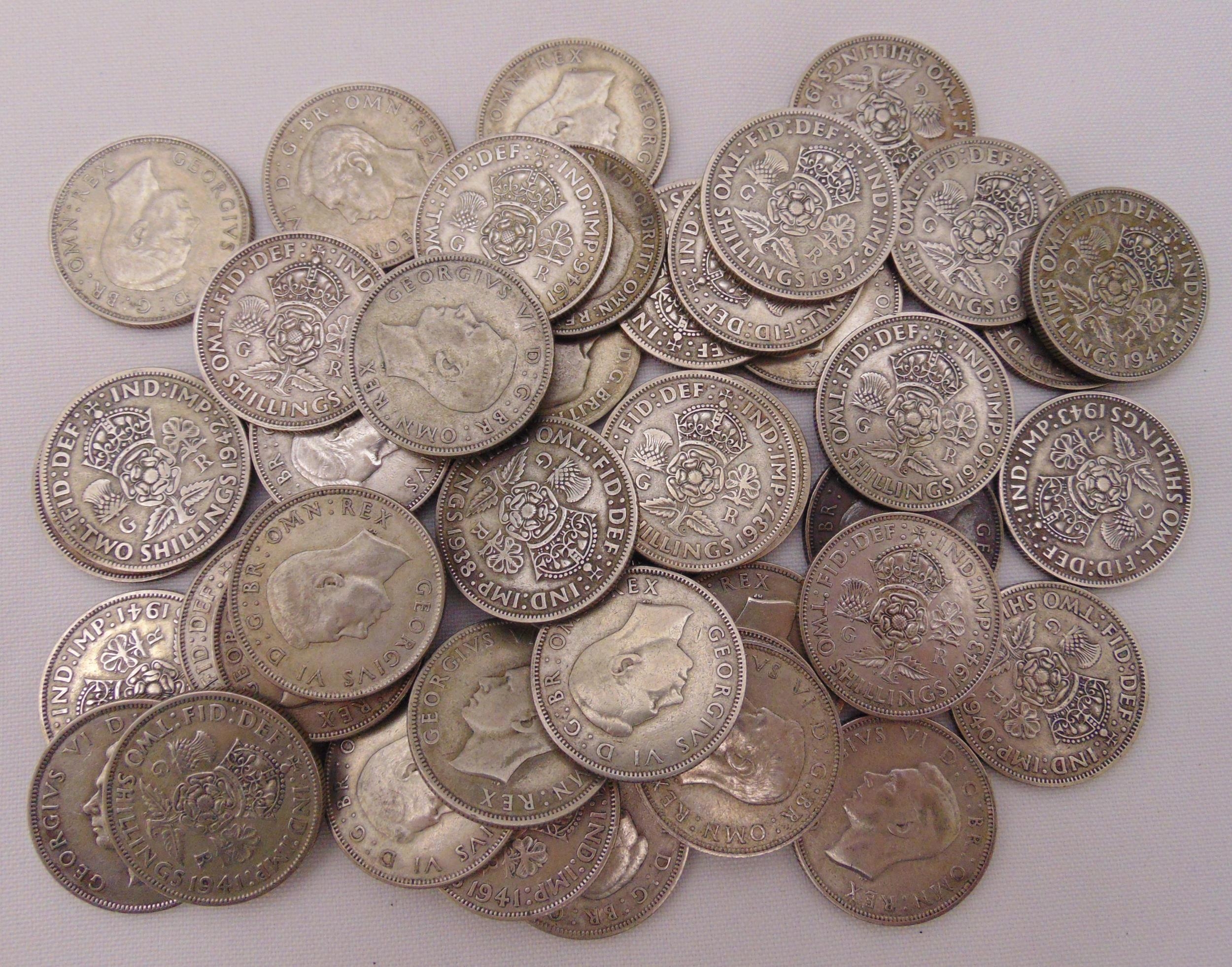 A quantity of GB pre 1947 silver two shillings (49) approx total weight ...