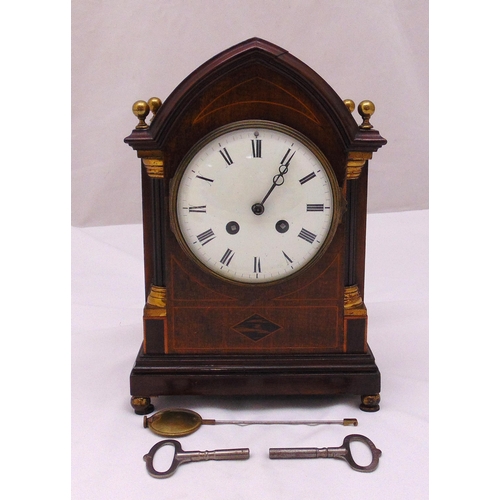 289 - An Edwardian mahogany and satinwood inlaid mantle clock, of architectural form, white enamel dial wi... 