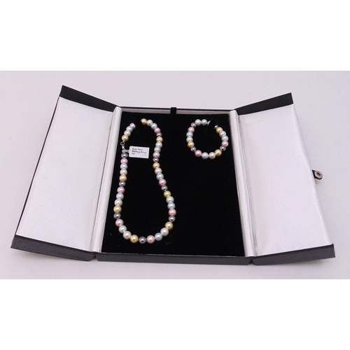 333 - Multicolour pearl necklace and bracelet set, hallmarked silver clasp, in presentation box