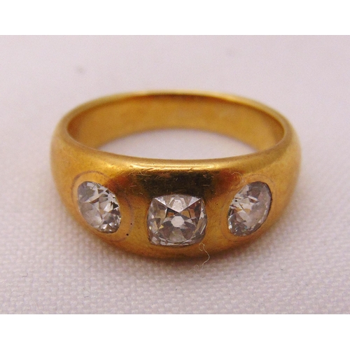 348 - Gold three stone gypsy set diamond ring, tested 18ct, approx total weight 8.9g