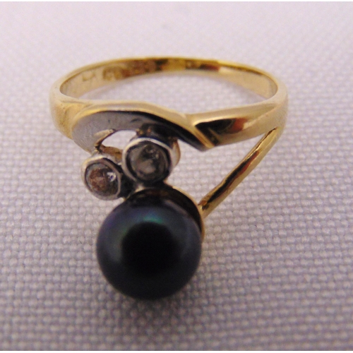 352 - 14ct gold ring set with a black pearl and diamonds, approx total weight 1.7g