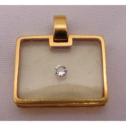 371 - 18ct gold pendant set with a diamond