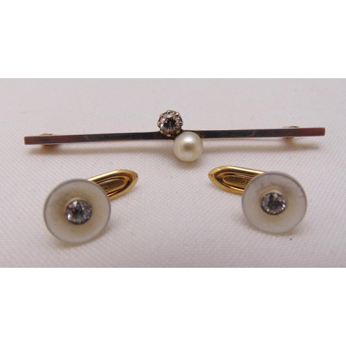 373 - Two 14ct yellow gold and diamond button studs and a 14ct yellow gold diamond and pearl tie pin