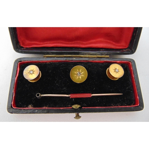 375 - Three 18ct gold and diamond dress button studs in fitted case