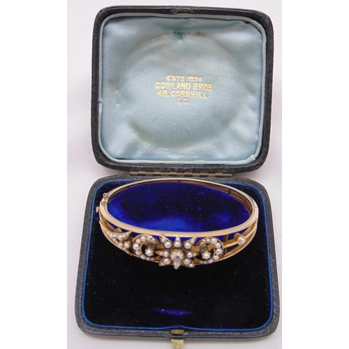 378 - A Victorian pearl and rose diamond bangle, approx total weight 21.6g