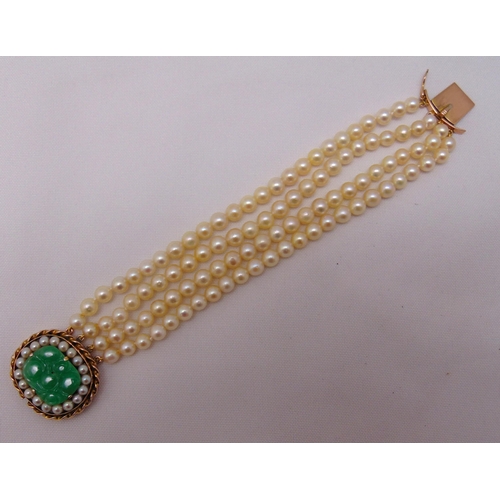 379 - 14ct yellow gold four strand cultured pearl and jade bracelet