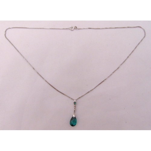 384 - 9ct white gold necklace with a coloured stone pendant, approx total weight 3.1g