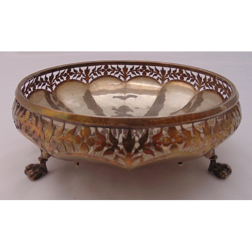 410 - A hallmarked silver circular fruit bowl with leaf pierced sides on three claw feet, approx total wei... 