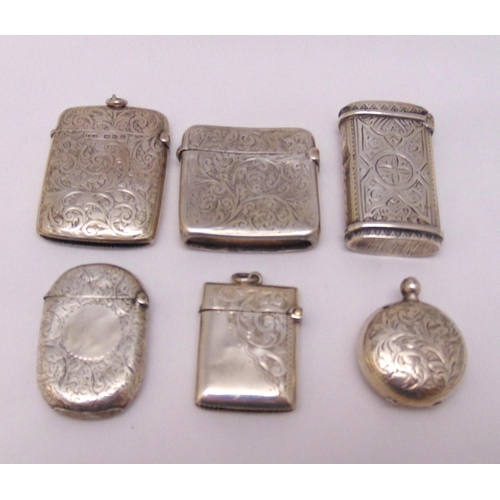 440 - Five hallmarked silver vesta cases, various shape, form and decoration and a circular sovereign case... 