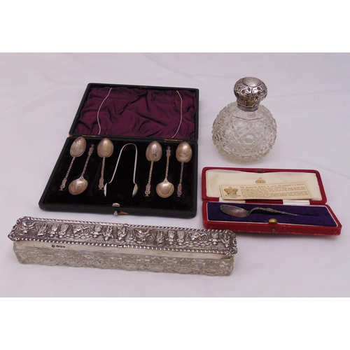 454 - A quantity of hallmarked silver to include a cased set of coffee spoons, two dressing table bottles ... 