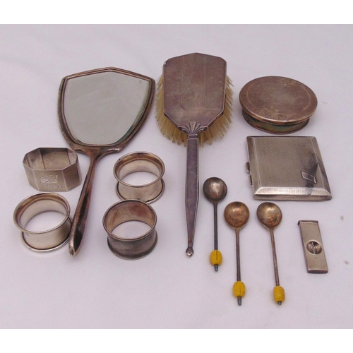 468 - A quantity of hallmarked silver to include four napkin rings, an engine turned cigarette case, a cig... 